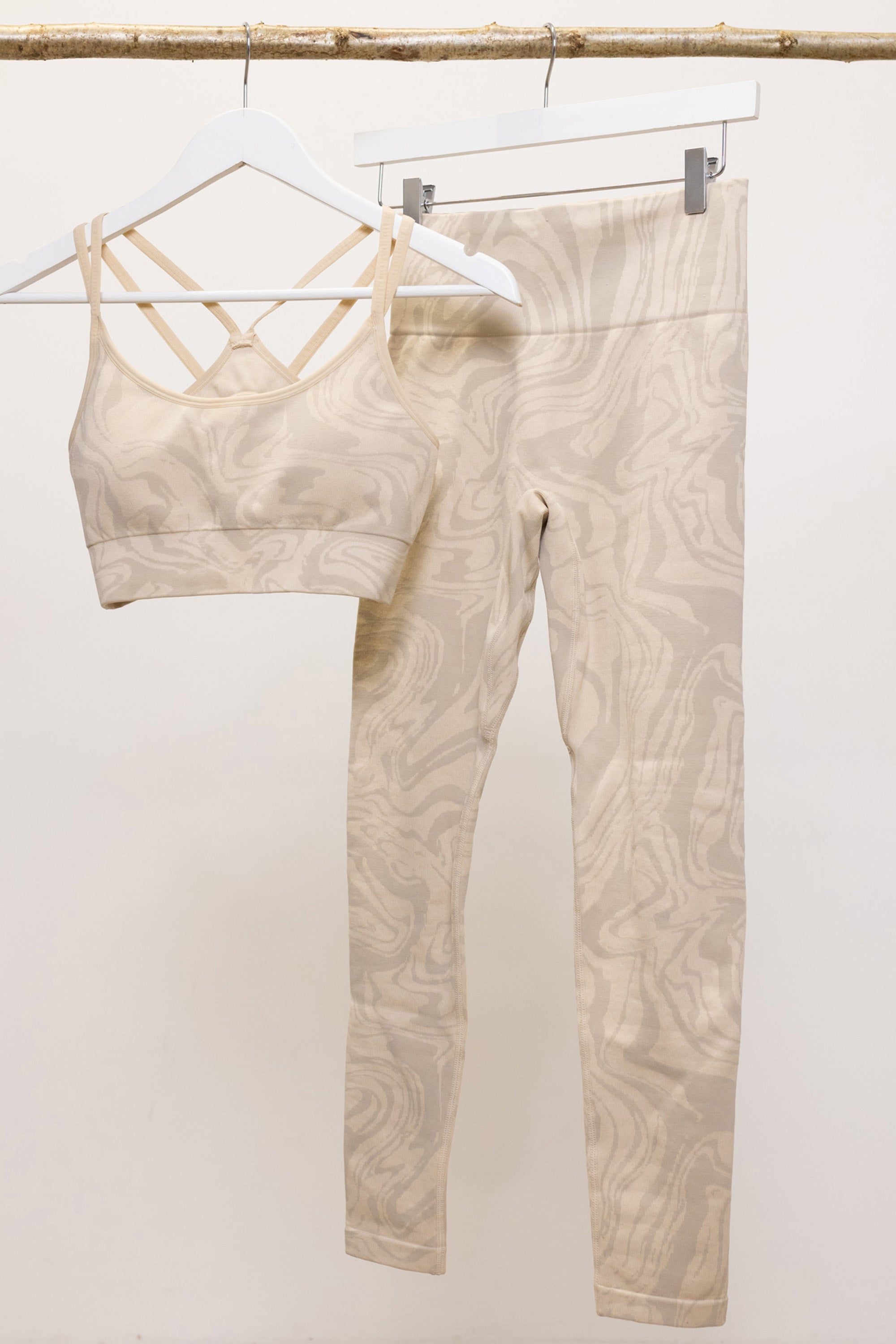 Light beige off white recycled seamless marble jacquard print full length high rise sculpting compressive leggings for yoga, pilates, barre, spinning, running, cycling and exercise.