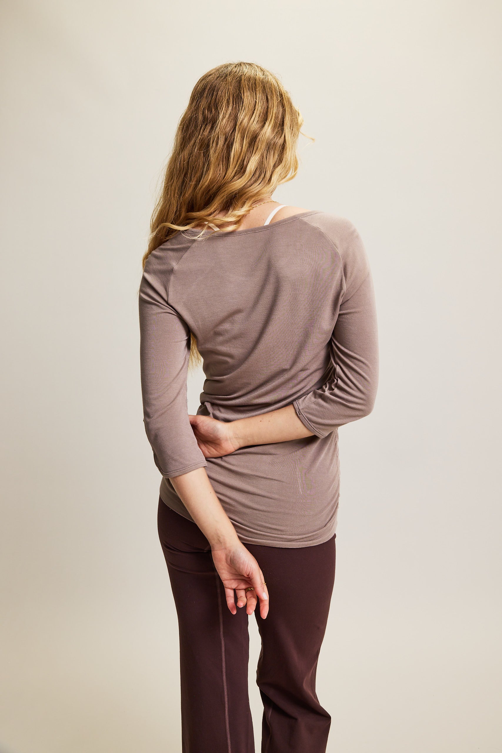 Beige light brown cream soft bamboo 3/4 sleeve performance round neck top with side ruching for yoga, pilates, running and exercise.