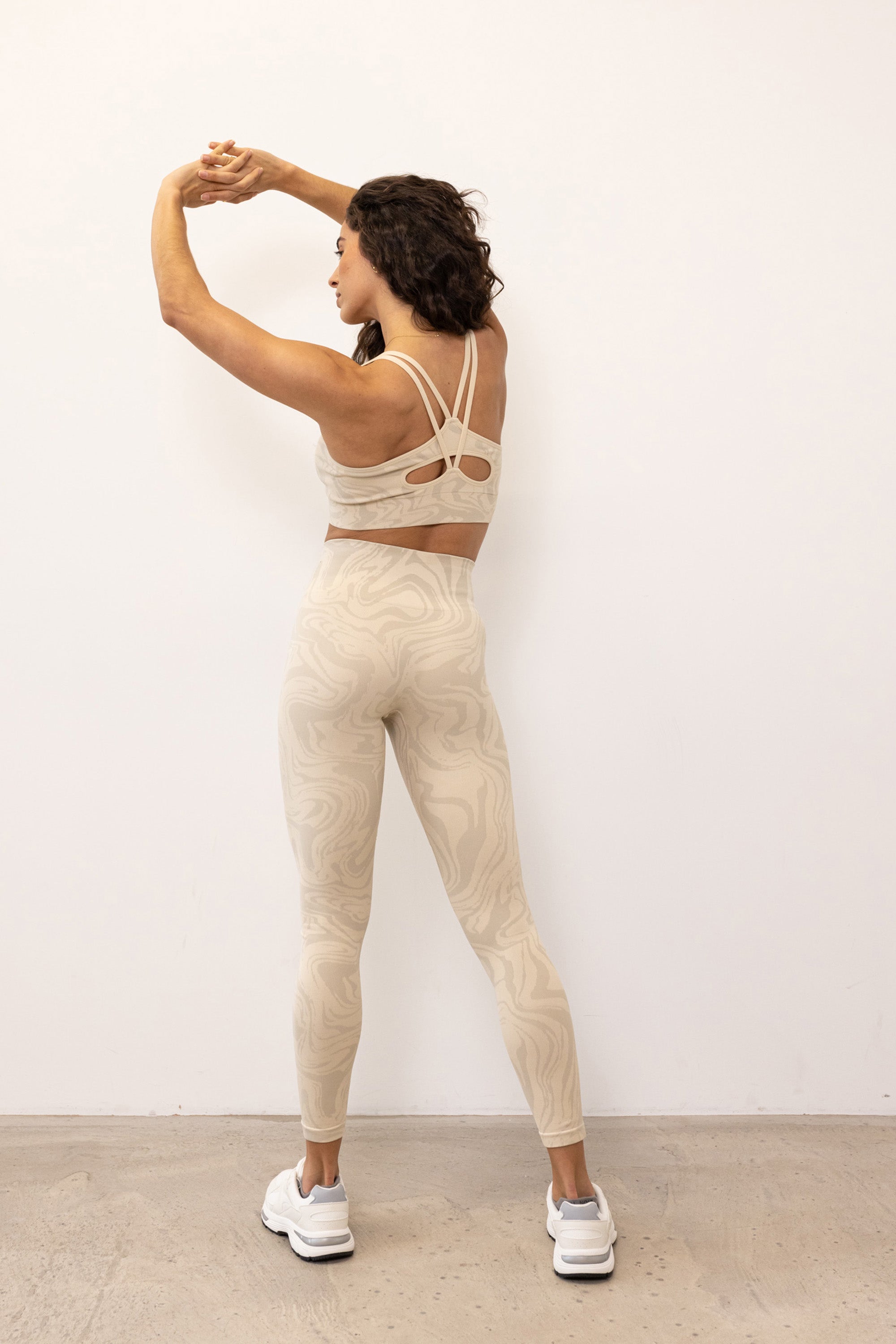 Light beige off white recycled seamless marble jacquard print full length high rise sculpting compressive leggings for yoga, pilates, barre, spinning, running, cycling and exercise.