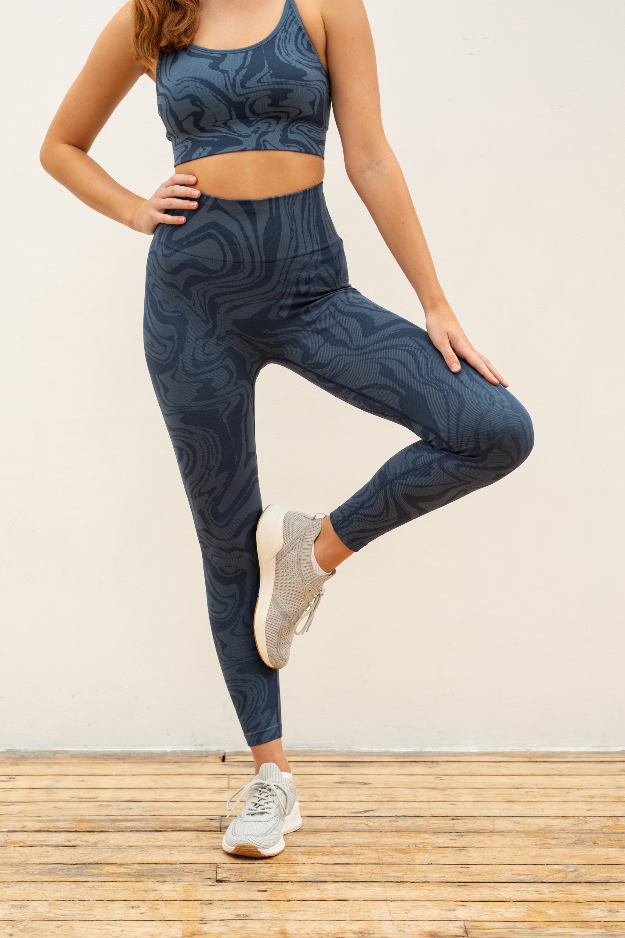 Denim blue recycled seamless marble jacquard print full length high rise sculpting compressive leggings for yoga, pilates, barre, spinning, running, cycling and exercise by sustainable activewear brand Jilla Active