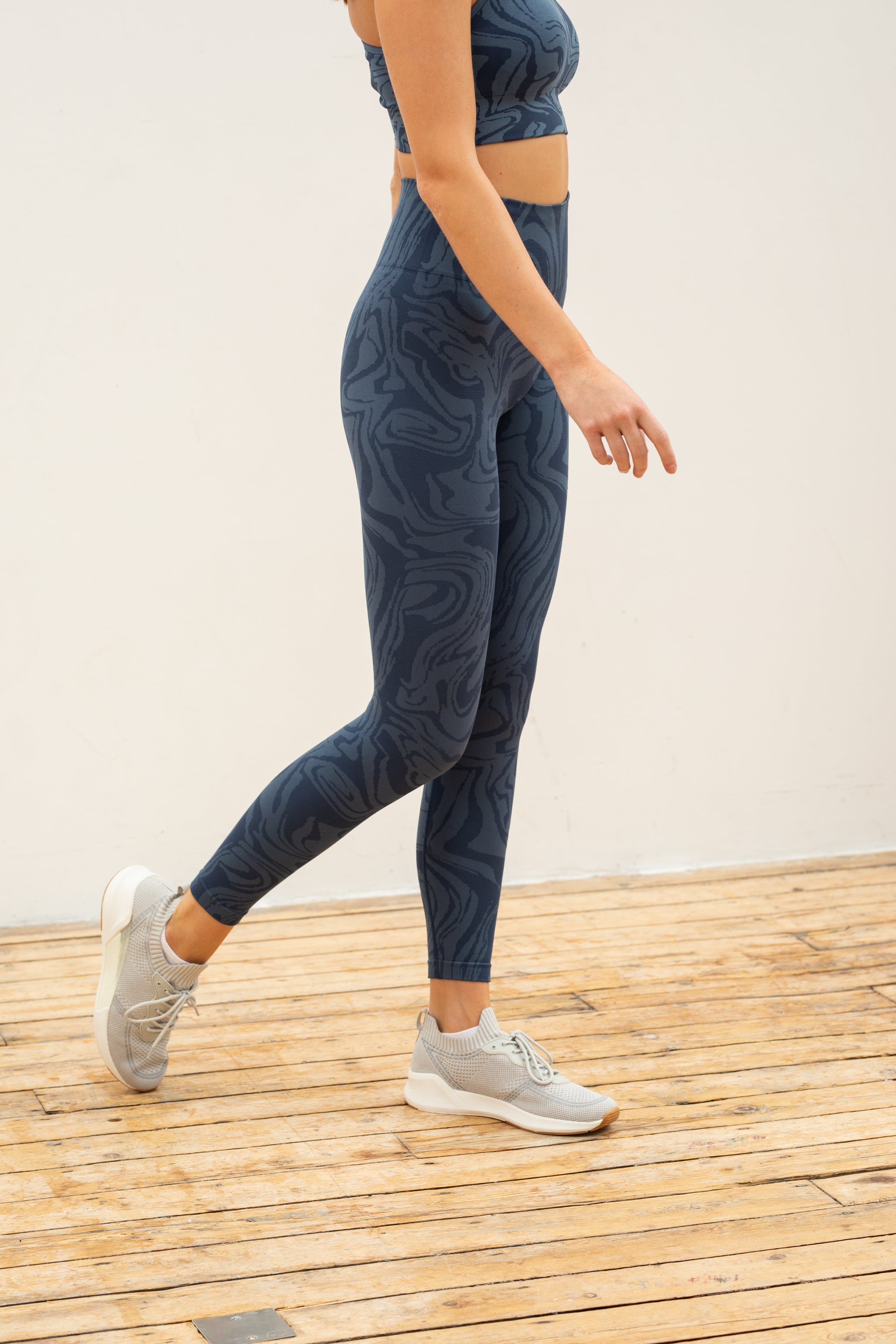 Denim blue recycled seamless marble jacquard print full length high rise sculpting compressive leggings for yoga, pilates, barre, spinning, running, cycling and exercise by sustainable activewear brand Jilla Active