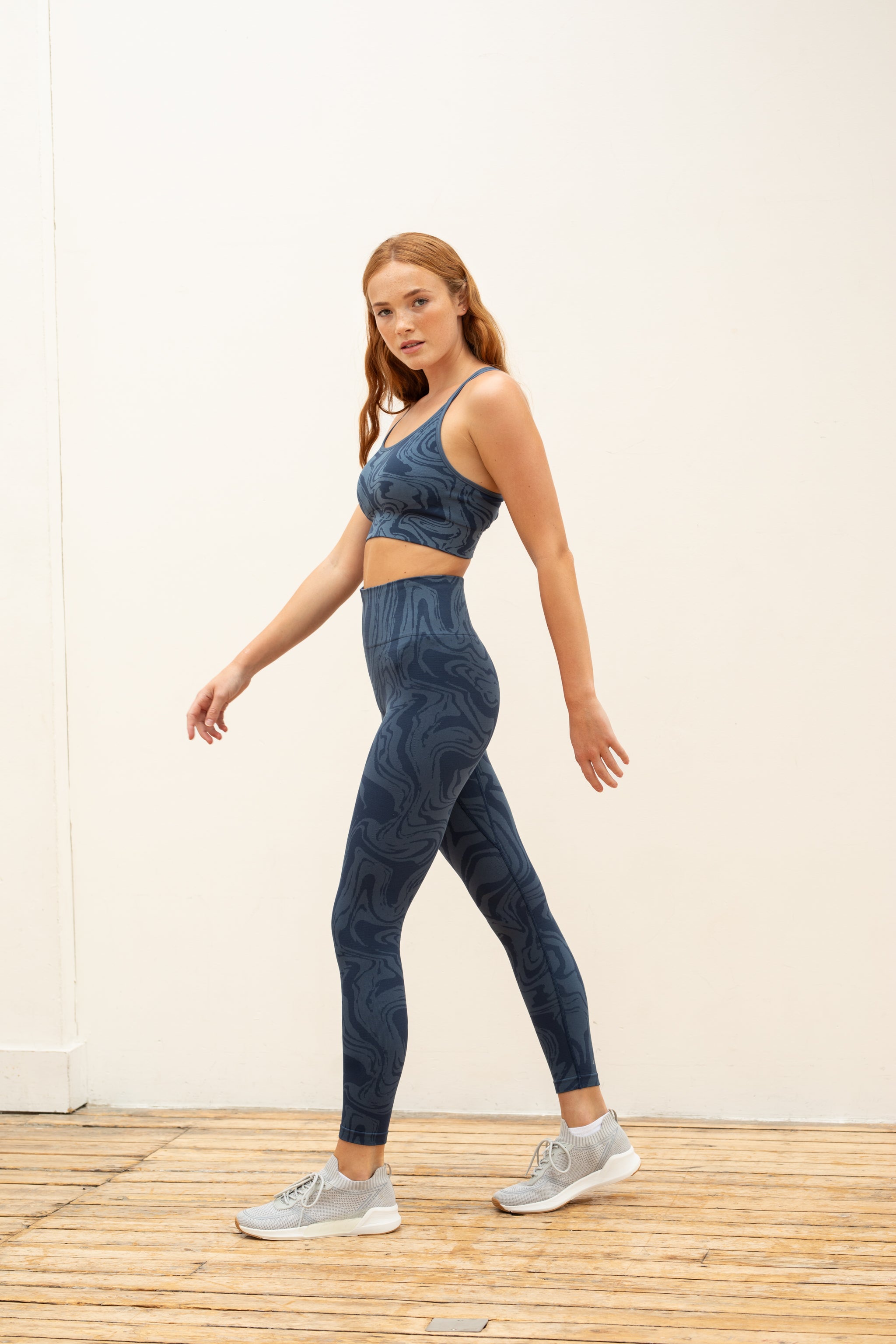 Denim blue recycled seamless marble jacquard print full length high rise sculpting compressive leggings for yoga, pilates, barre, spinning, running, cycling and exercise by sustainable activewear brand Jilla Active
