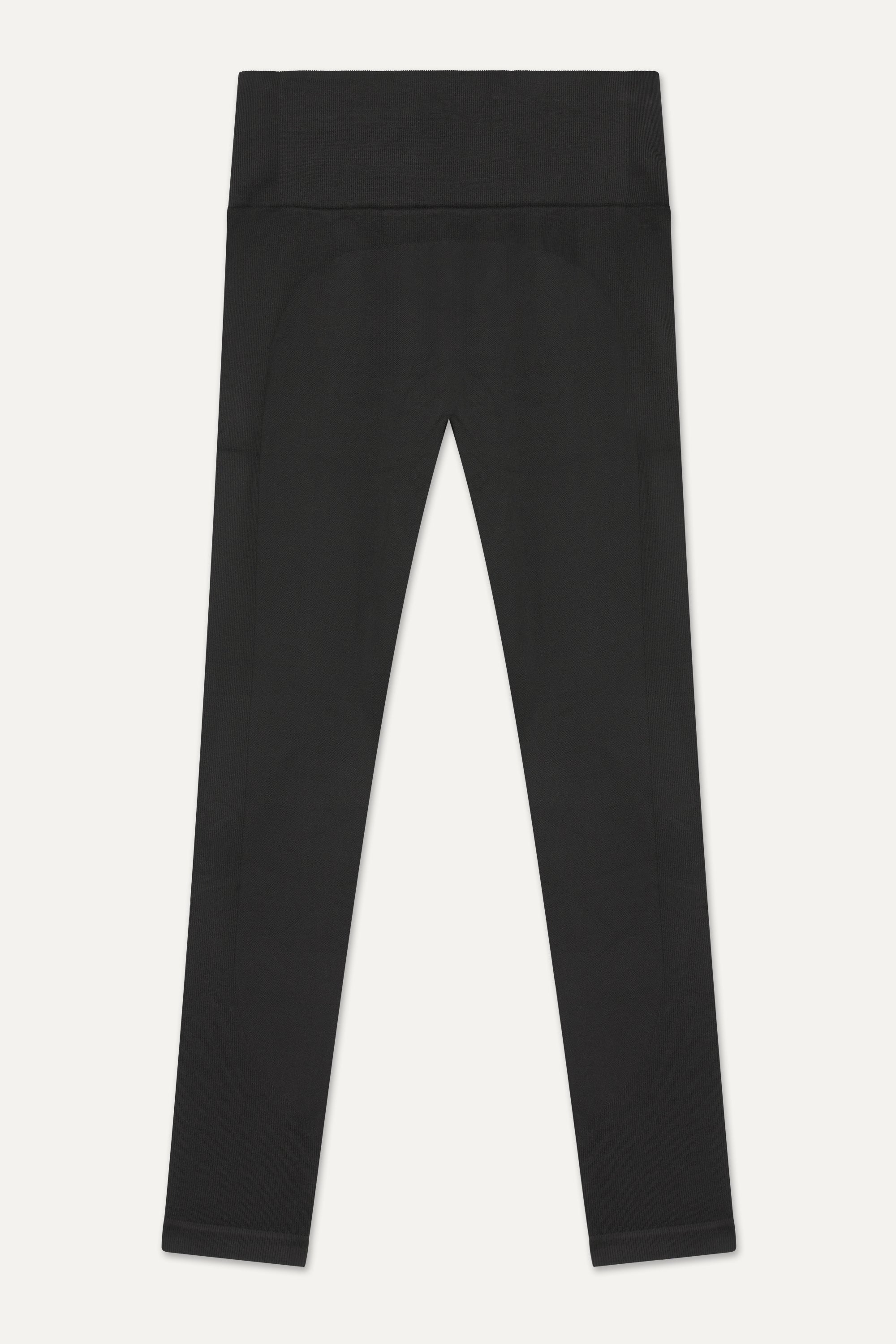 Black supportive sports bra and black recycled cropped leggings.