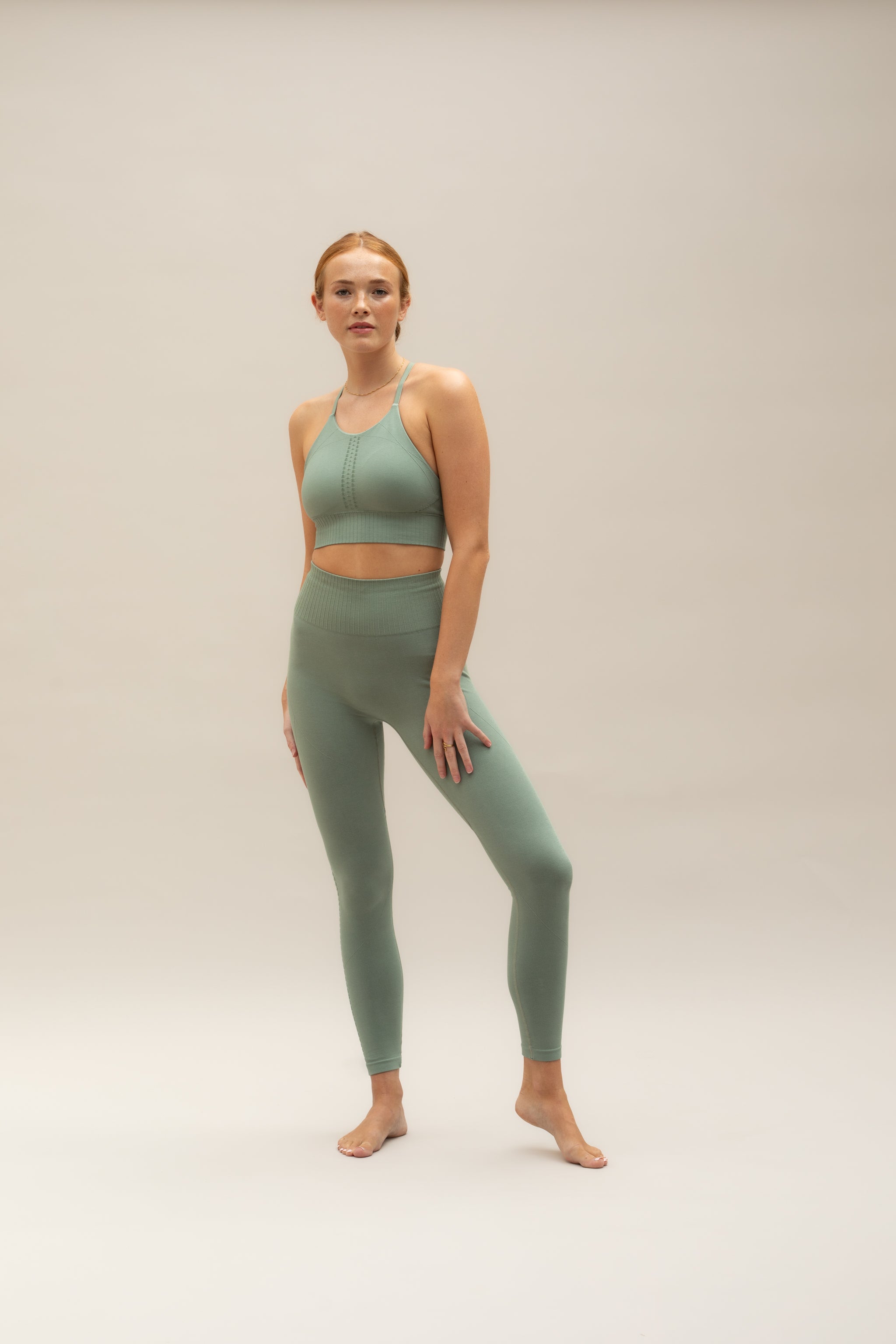 Green supportive modal cropped sports bra and green high waisted modal leggings.