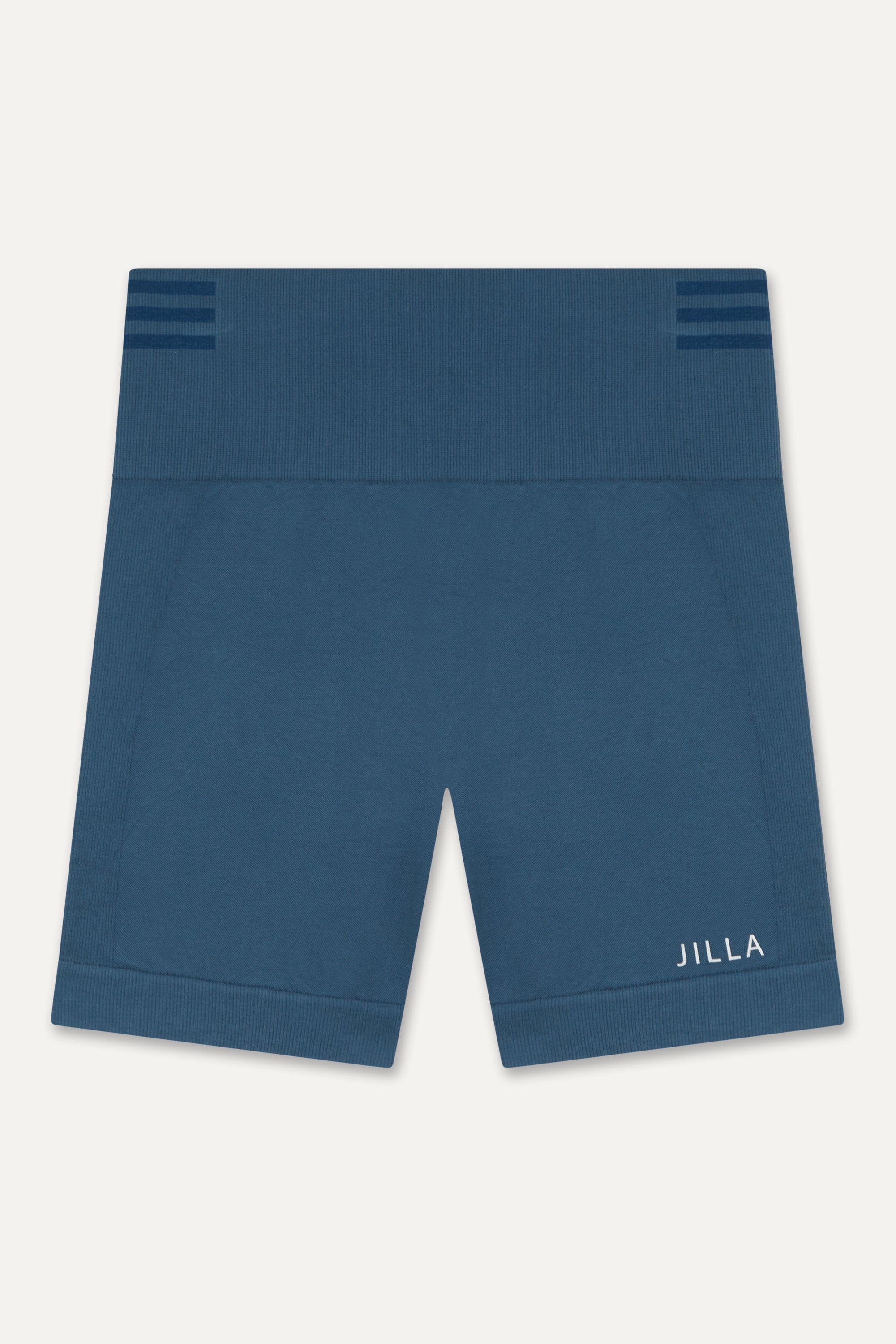 Introducing our denim blue Tone & Lift Recycled Shorts: Your go-to for summer workouts! Made with four-way stretch fabric and ribbing panels, they offer a flattering fit for any activity. Featuring a high-rise ribbed waistband and 5" inseam, they ensure comfort and style. With contrasting colors and internal elastic, they're both fashionable and functional. Pair with our matching bra and Sky's The Limit Oversized T-shirt for a complete look. 