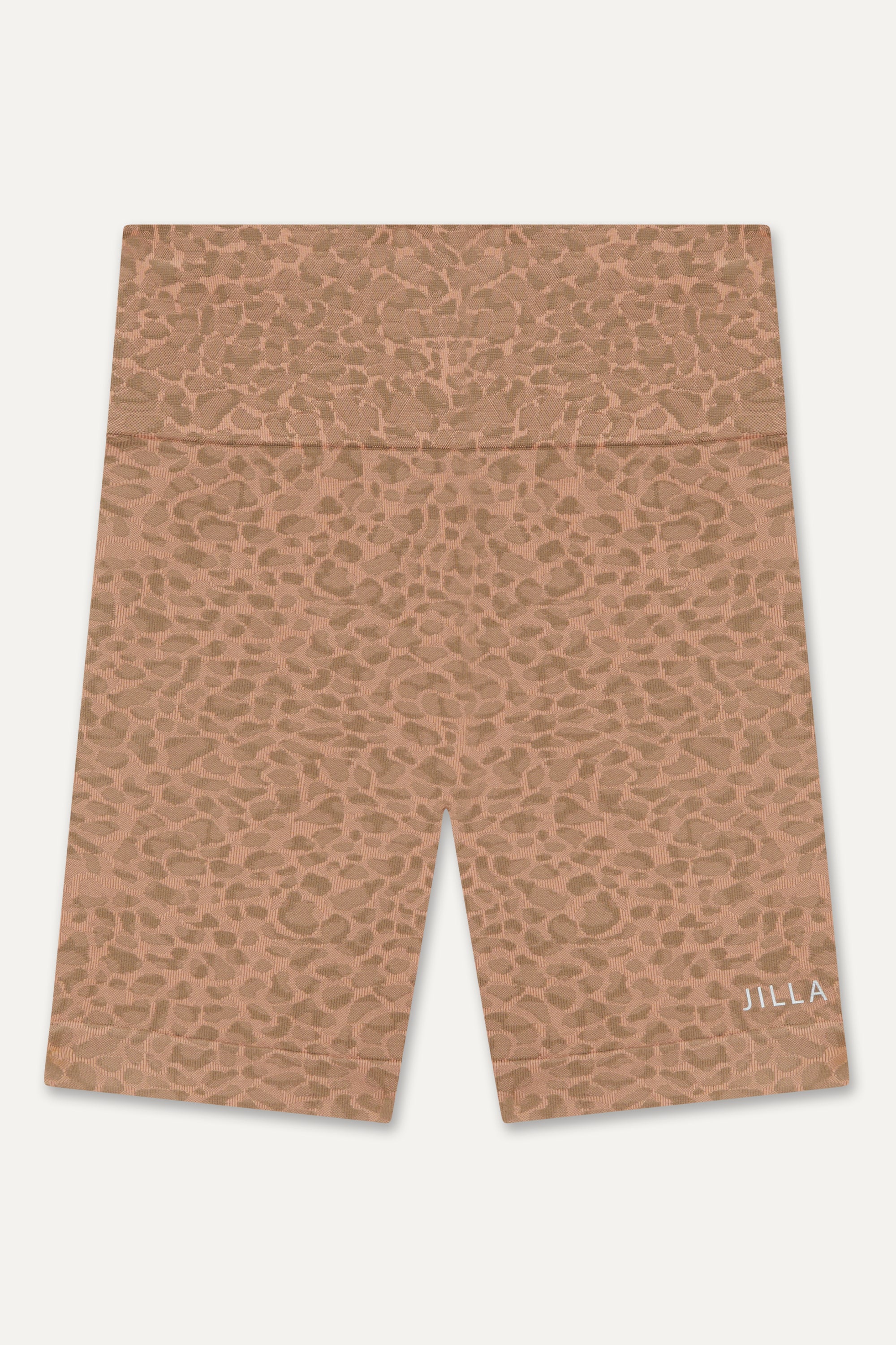 Prepare for summer with our Sahara Recycled Shorts, seamlessly knitted in our new animal jacquard. With a wide ribbed waistband and a mid-thigh finish, they're perfect for studio classes, gym workouts, and everyday style. The internal waistband elastic and four-way stretch fabric ensure they stay in place all day. Complete your look by pairing them with the matching bra and oversized tee.