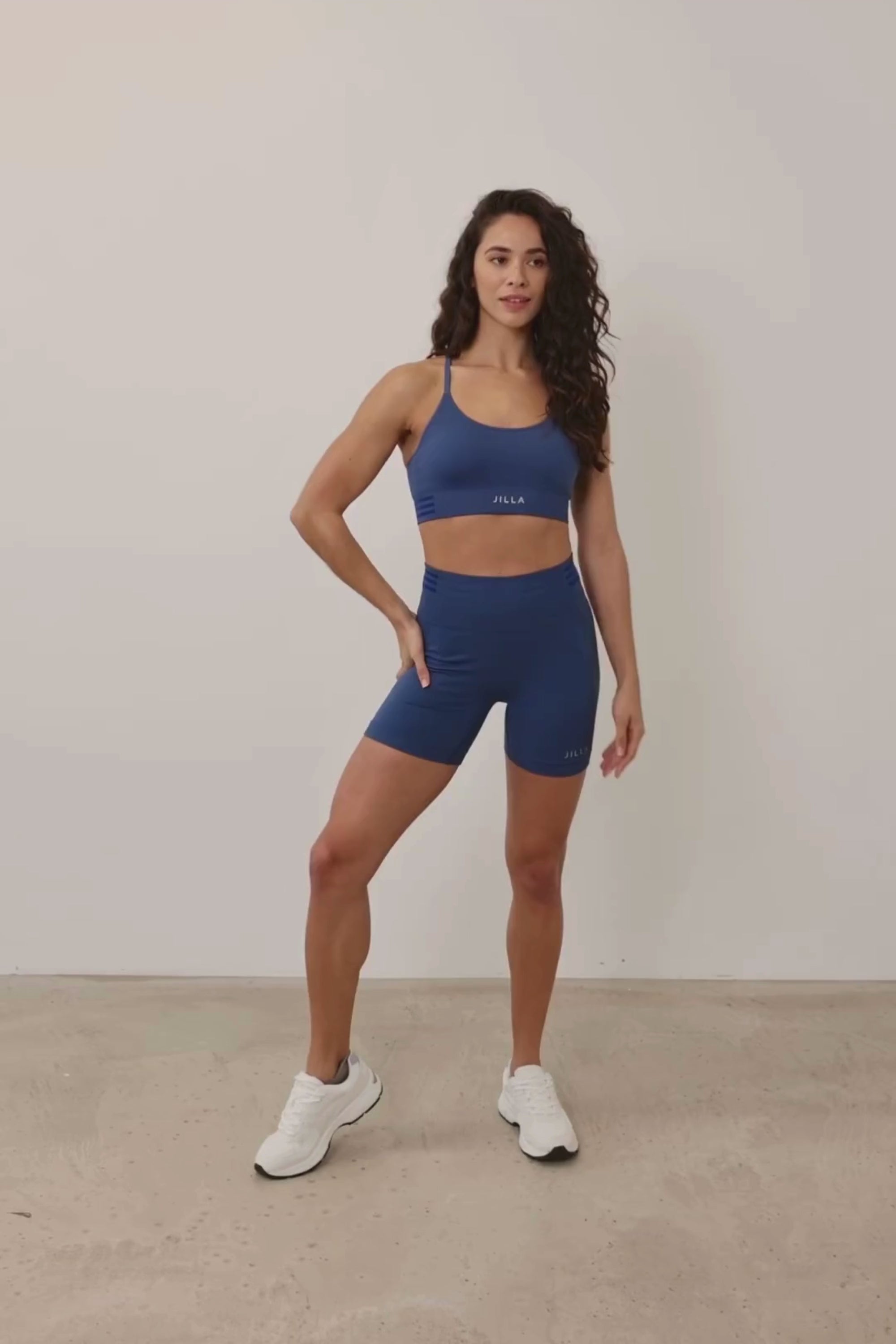 Introducing our denim blue Tone & Lift Recycled Shorts: Your go-to for summer workouts! Made with four-way stretch fabric and ribbing panels, they offer a flattering fit for any activity. Featuring a high-rise ribbed waistband and 5" inseam, they ensure comfort and style. With contrasting colors and internal elastic, they're both fashionable and functional. Pair with our matching bra and Sky's The Limit Oversized T-shirt for a complete look. 