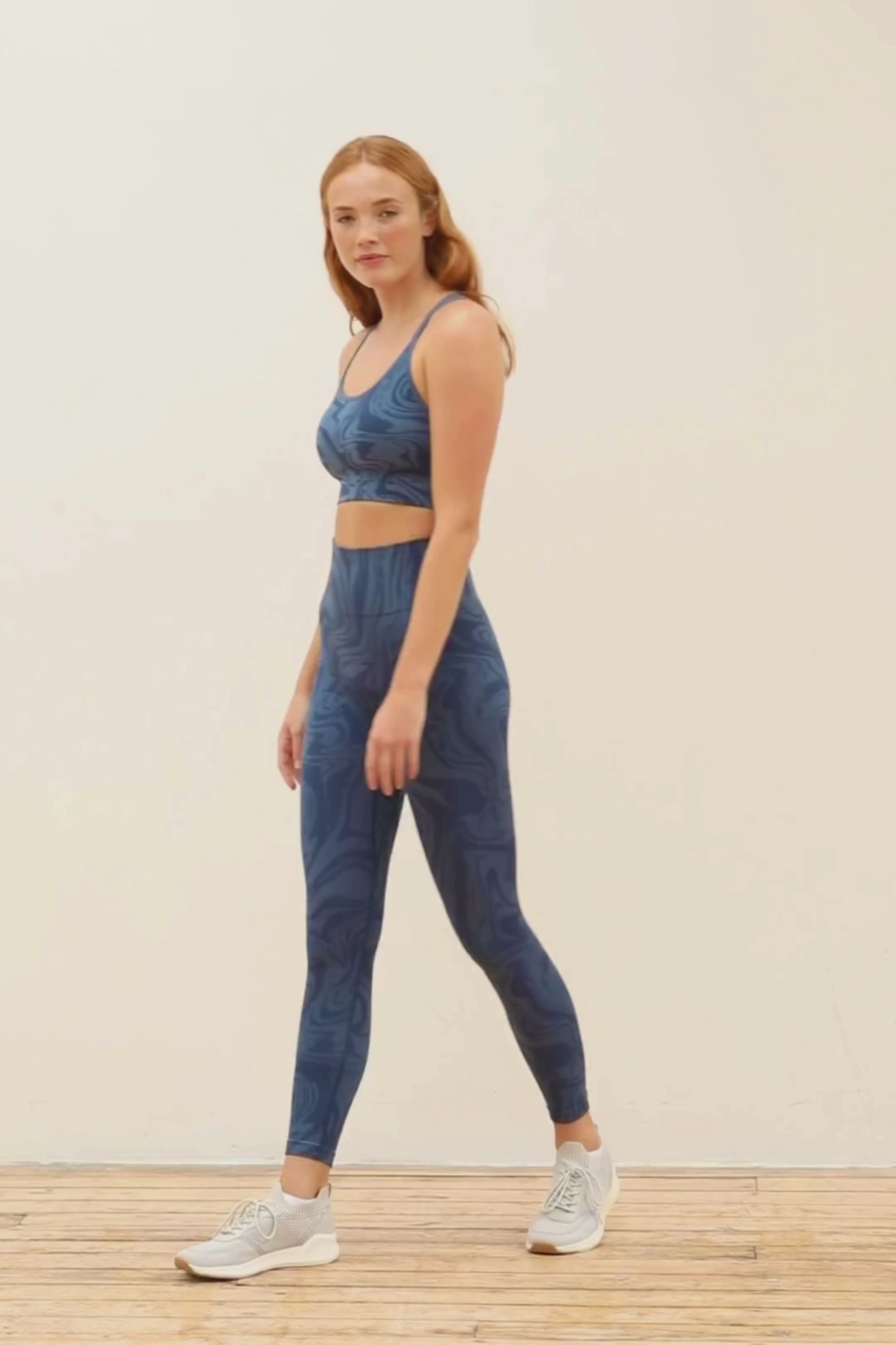 Denim blue recycled seamless marble print low to medium impact supportive sports bra for yoga, pilates, spinning, weights, running and exercise by sustainable activewear brand Jilla Active 